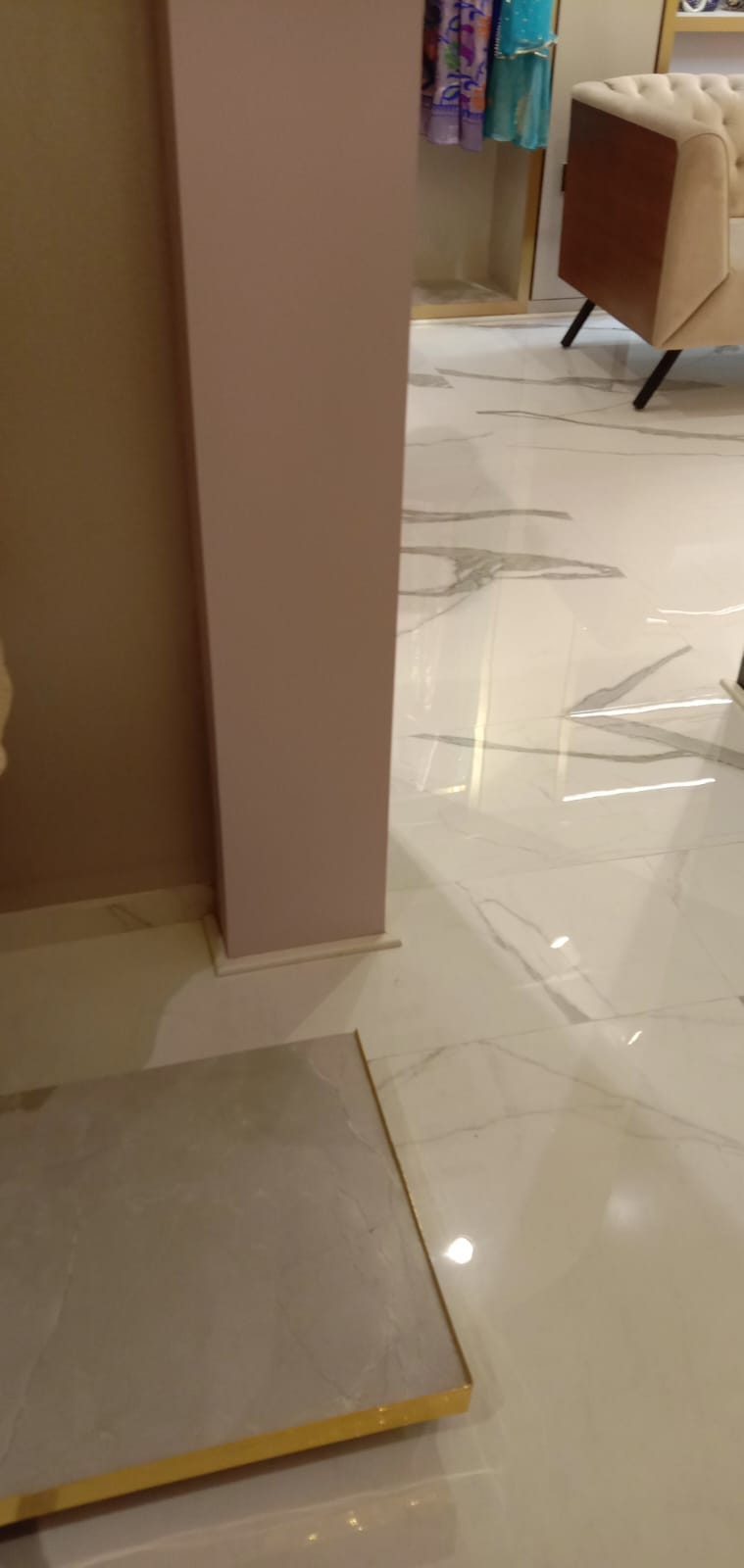 Boutique Showroom Marble Flooring & Golden Edge Trims